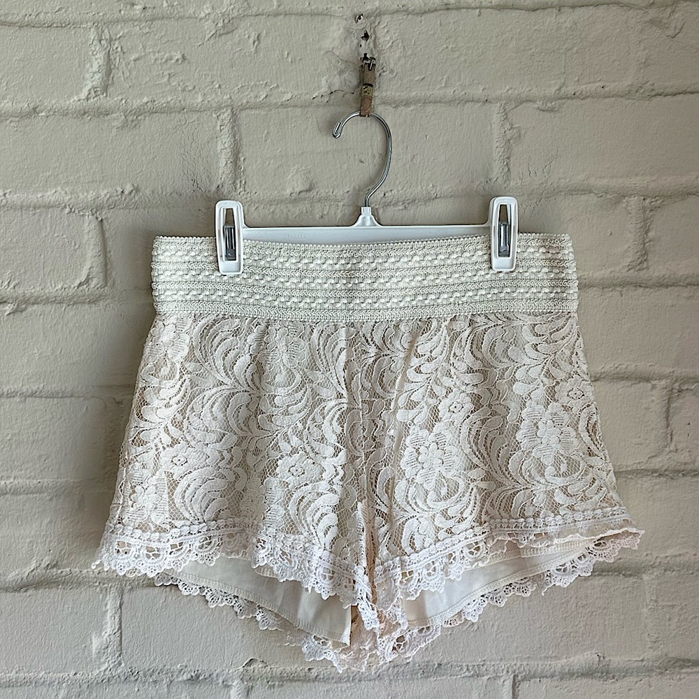 Ambiance Apparel size medium cream colored floral embroidered lace shorts
